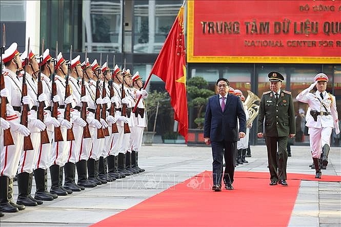Thủ tướng Phạm Minh Chính đến dự Hội nghị Công an toàn quốc. Ảnh: Dương Giang/TTXVN