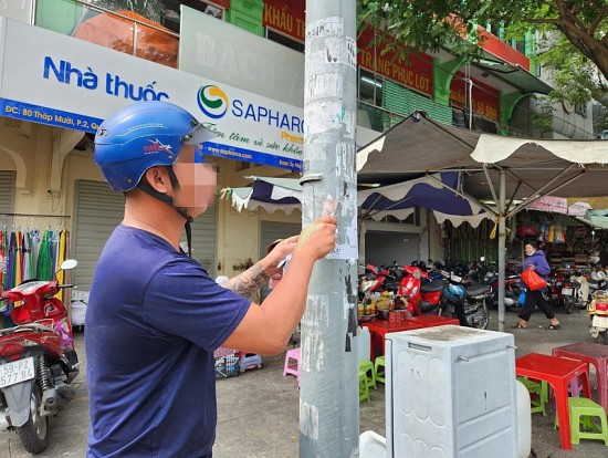 TP. Hồ Chí Minh: Liên tiếp xử lý các đối tượng dán quảng cáo bẩn