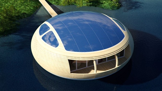 Mái của ngôi nhà được lắp thêm những tấm pin năng lượng mặt trời